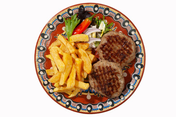 Meatballs with fries and salad