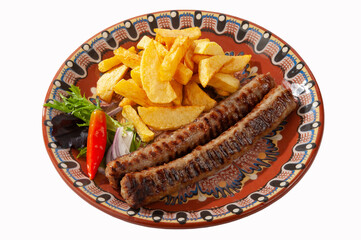 Kebabs with fries and salad