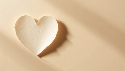 Fototapeta premium Showing torn heart-shaped white paper curling while casting soft shadow on beige paper, copy space