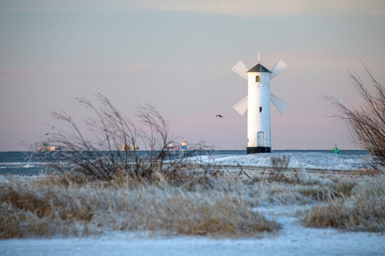 Stawa Młyny Beacon in Swinoujscie During Frozen Winter on the Baltic Sea