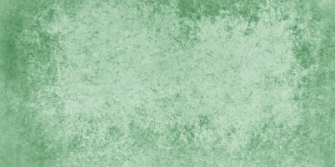 Obraz premium Abstract Elegant dark green background with mottled vintage texture in old fancy background design, texture of colored parchment paper. 