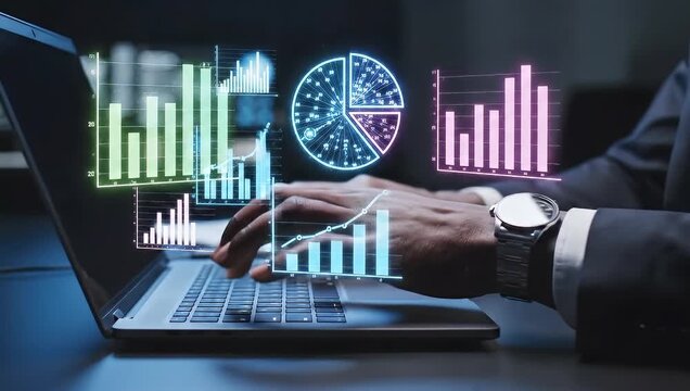 Business professional analyzing financial data on laptop with futuristic graphs and charts displayed on screen in a modern office setting