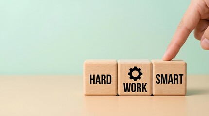 Fototapeta premium hard work vs smart work concept with wooden blocks