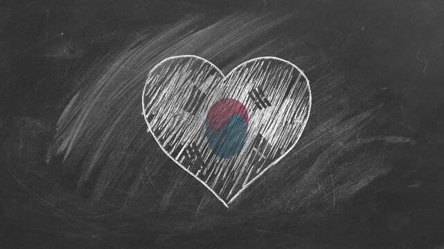 The heart-shaped national flag of Flag of South Korea, drawn with colored chalk on a blackboard. Korean language, learning Korean.