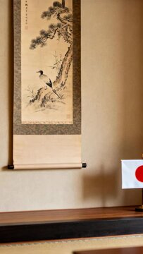 Vertical video: Panning camera moving kakejiku toward center to frame scene in alcove, with flag
