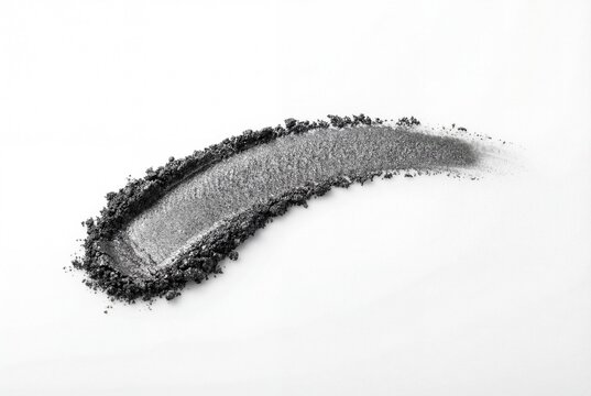 Metallic charcoal eye shadow powder swatch with shimmer texture isolated on white