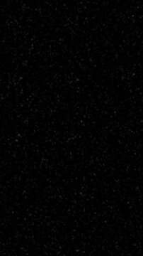 Vertical film grain texture appears with posterize time effect on a black screen. Built to add analog motion texture. Ideal for vertical edits, reels, and cinematic overlays