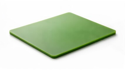 Fototapeta premium Green plastic kitchen cutting board isolated on a clean white background.
