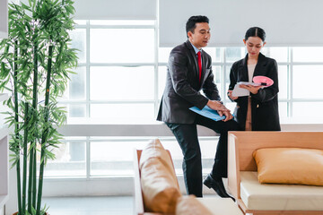 Professional Colleagues Brainstorming Ideas in a Modern Collaborative Workspace