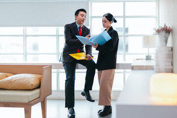 Professional Colleagues Brainstorming Ideas in a Modern Collaborative Workspace