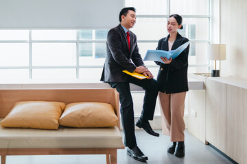 Professional Colleagues Brainstorming Ideas in a Modern Collaborative Workspace