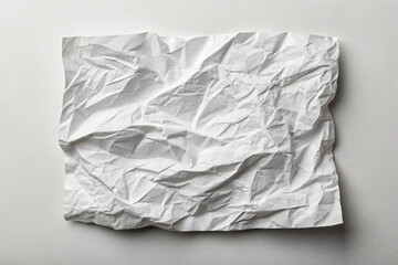 Obraz premium Crumpled white paper with rough textured surface and blank sheet background