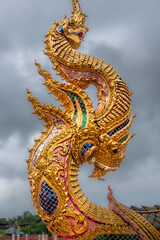 Fototapeta premium architectural element of the Wat Kaew don Tao Suchadaram, a temple in Lampang, Thailand