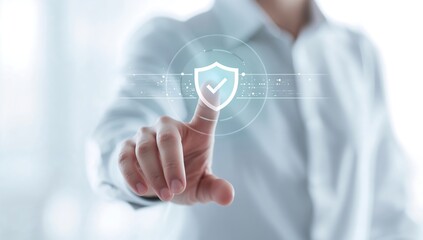 Businessman activating digital security shield with finger touch