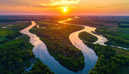 Wide river delta at sunset, magic hour glow, aerial perspective