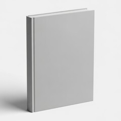 A thick, hardcover book with a plain gray cover standing upright on a white surface.