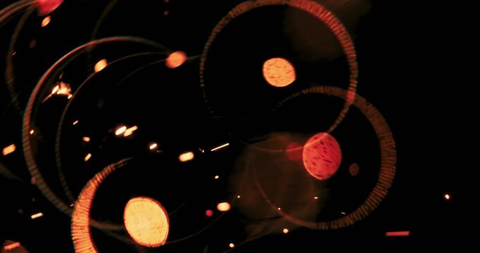 Stunning metal sparkles create a mesmerizing abstract motion effect on a deep dark background. This visual is ideal for enhancing motion graphics as well as various creative design projects