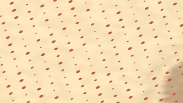 analyzing abstract motion in soft warm tones and dotted patterns