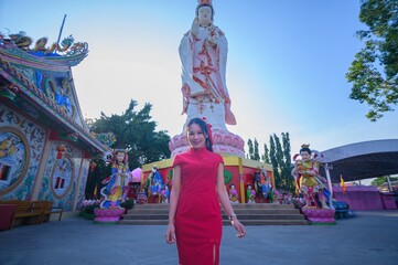 Young Girl in Traditional Red Dress Celebrating Lunar New Year Festival