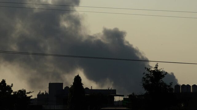 Air pollution through burning fire outdoor.