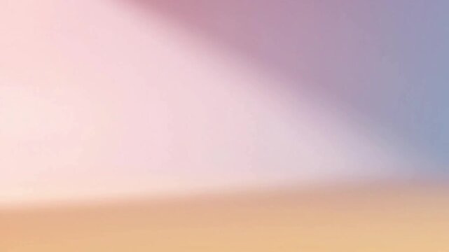 Dynamic Pastel Gradient A seamless gradient of two complementary pastel colors (e.g., lavender to mint) slowly shifting under a soft, diffused side light, creating subtle movement and light play.