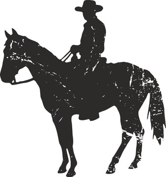 Silhouette of a cowboy riding a horse with western hat and vintage distressed texture