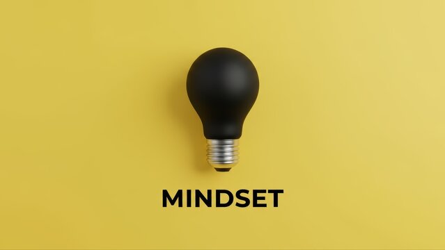 A black lightbulb on yellow background representing a focused mindset, creative mind, and strategic business idea.