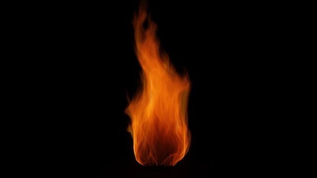 Fire Torch bonfire isolated on black background. 4K Loop Footage for overlay compositing with Linear Dodge blending mode. Small flames of fire on a black background. Hot realistic fire in 4K