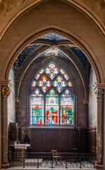 Fototapeta premium Bourges, France - 10 25 2025: Saint Stephen's Cathedral. Detail view of Stained glass window of Saint Solange