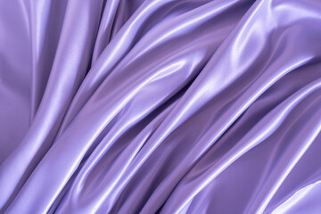 Obraz premium Beautiful smooth elegant wavy purple satin silk luxury cloth fabric texture, abstract background design. Copy space.