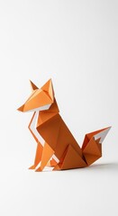Obraz premium Orange folded paper sculpture of a wild canine rests upon a bright white surface.