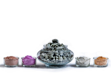 Multiple Bowls Contain Different Colored Powders