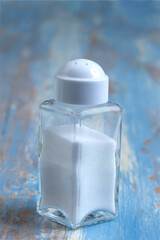 Salt Shaker on a Blue Wooden Table