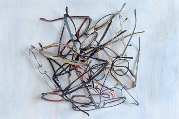 Glasses Pile on Light Background
