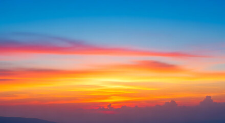 Fototapeta premium Vibrant sunset sky with orange pink and blue hues cloudy landscape background