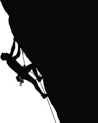 Silhouette of rock climber scaling steep cliff face with orange background