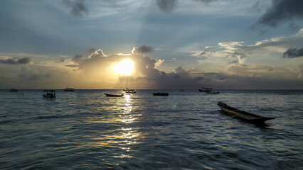 Every sunrise and sunset transforms the blue scenery of Morer&eacute; Beach on Boipeba Island, Bahia.