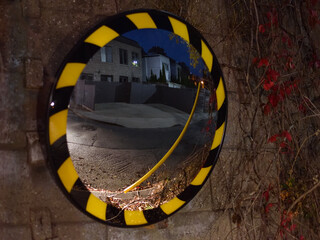 Naklejka premium Reflection of Residential Neighborhood in a Street Mirror in Toronto, Ontario, Canada