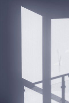 empty white wall with sunlight