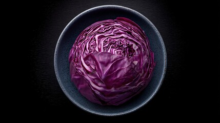 Obraz premium Red cabbage photographed for recipe cover image, centered bowl, copy space preserved