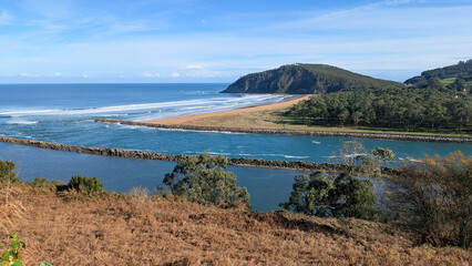 Obraz premium Rodiles Beach and the mouth of the Villaviciosa estuary, aerial view, Asturias, Spain