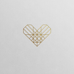 Golden geometric heart line art design. Love symbol isolated on white.
