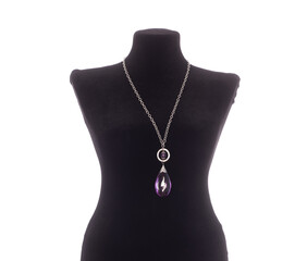 Necklace with amethyst on a mannequin isolated on white background
