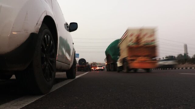 Car parked on Highway during rush hour traffic time lapse during rush hour.