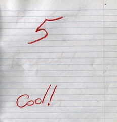 Lined notebook paper background with handwritten word Cool and number five in red pencil. Minimalist textured stationery surface, school notebook page &mdash; highest score