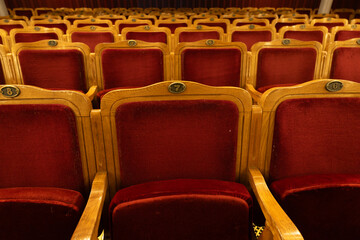 Vintage Red Velvet Theater Seats With Numbered Plaques