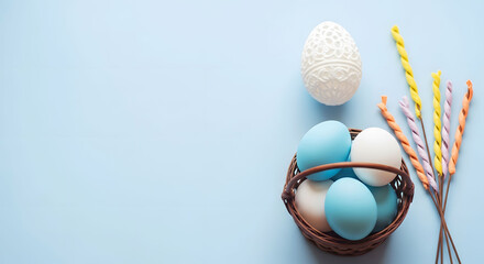 Easter day celebration with blue and white eggs in a basket