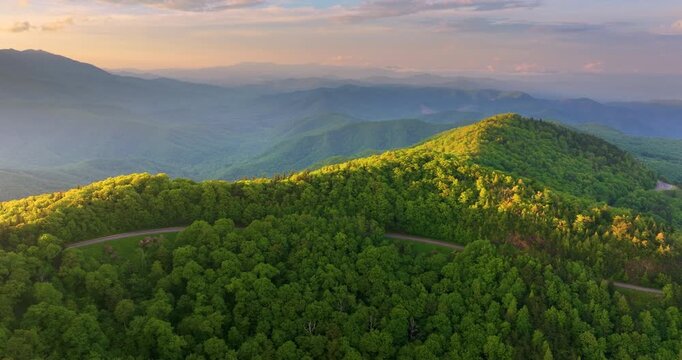 Blue Ridge Parkway road trip. Evening Appalachian mountains landscape. Driving car exploration travel in summer forest in North Carolina. Summertime landscape of beautiful nature