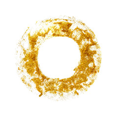 Gold glitter circle on white surface
