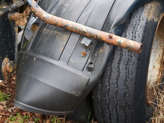 Old bracket from a truck wheel arch 